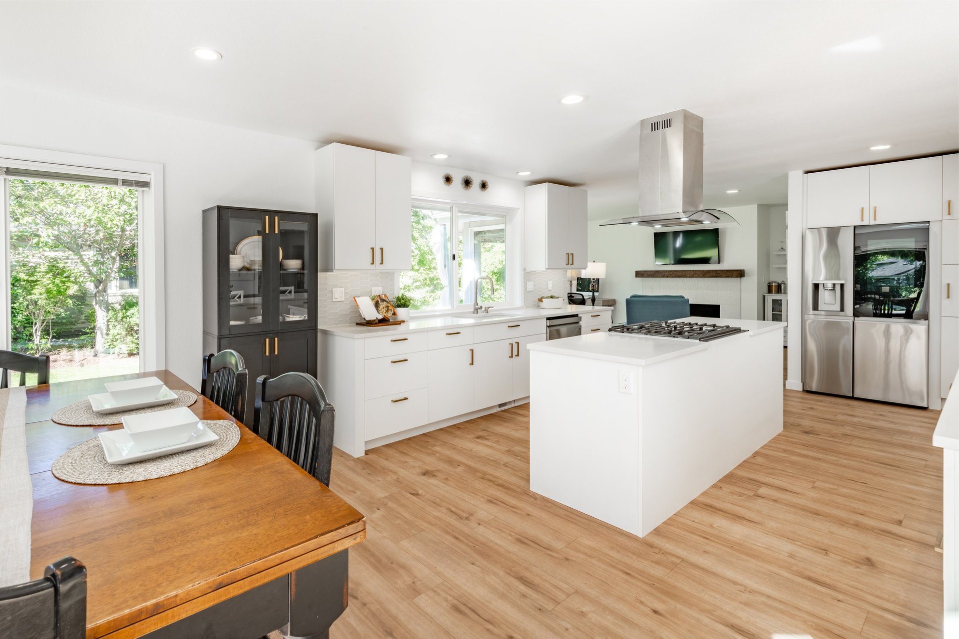 Custom kitchen remodel in Lake Forest, IL by Century Kitchens & Bath featuring white cabinets, marble countertops, and elegant design