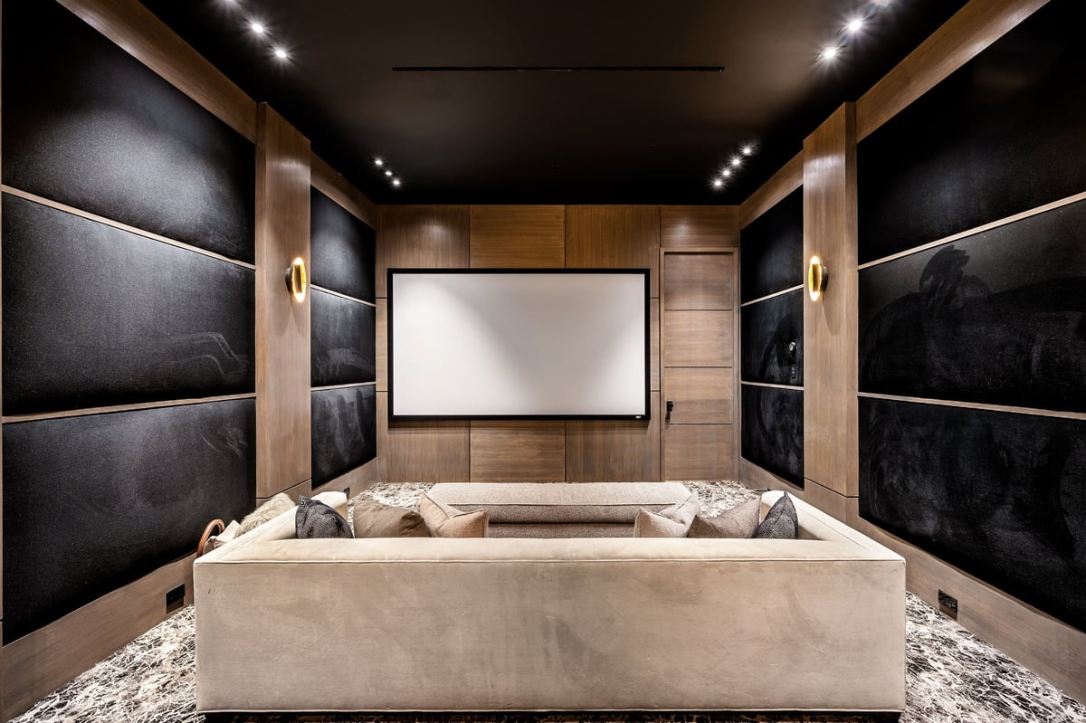 Finished basement in Grayslake, IL by Century Kitchens & Bath with home theater and entertainment area