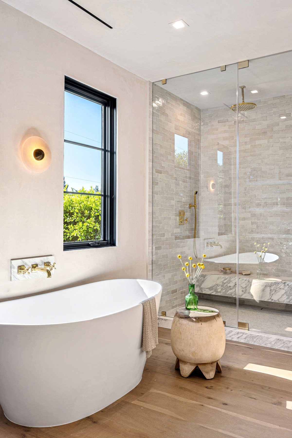 Lake Bluff, IL primary bathroom remodel by Century Kitchens & Bath featuring curbless walk-in shower and double Bertch vanity