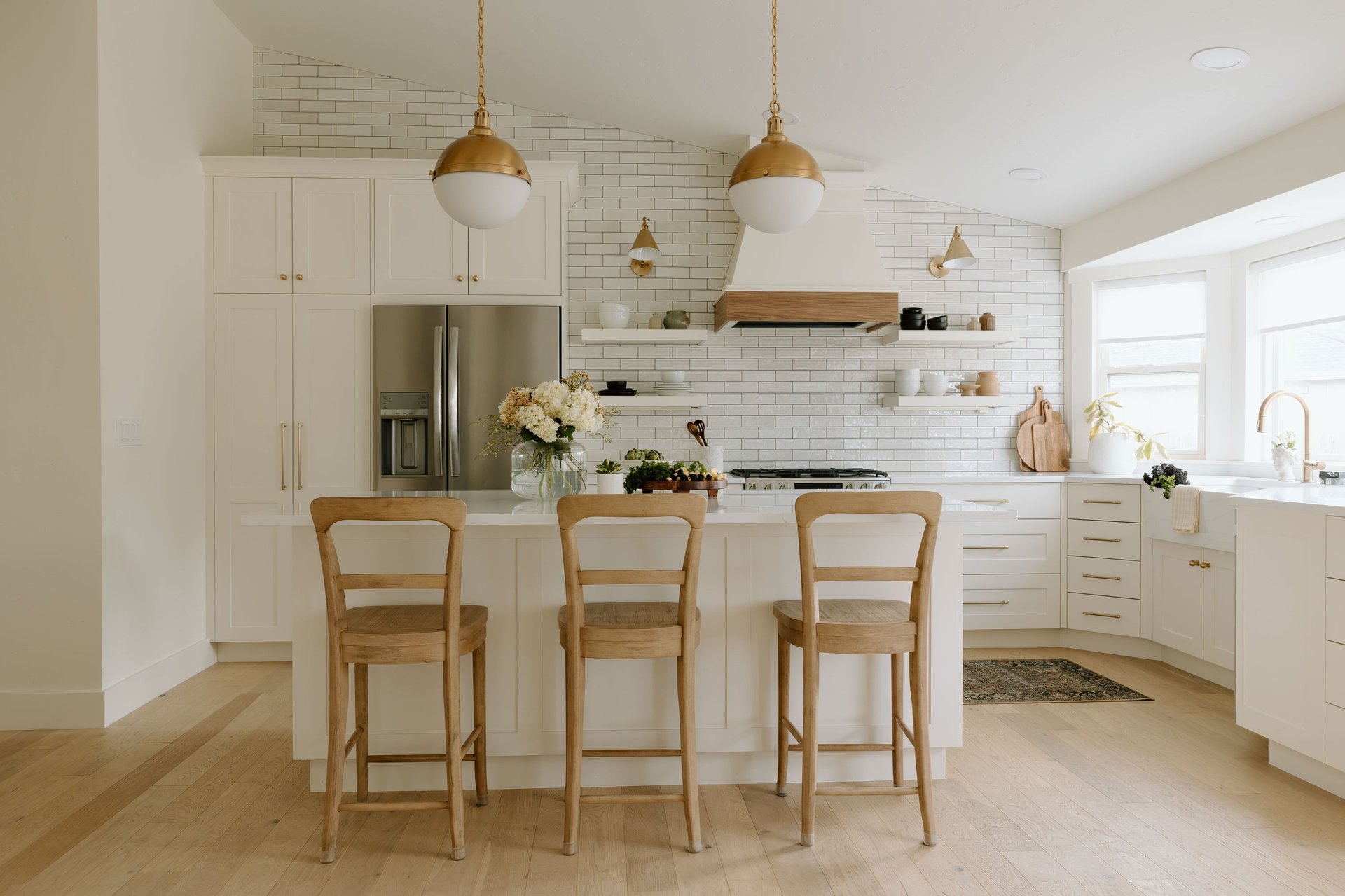 Custom kitchen remodel in Libertyville, IL by Century Kitchens & Bath featuring white cabinets, quartz countertops, and transitional design