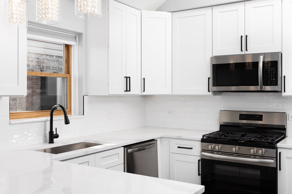 Lake Bluff, IL kitchen renovation by Century Kitchens & Bath featuring traditional shaker cabinetry and quartz countertops