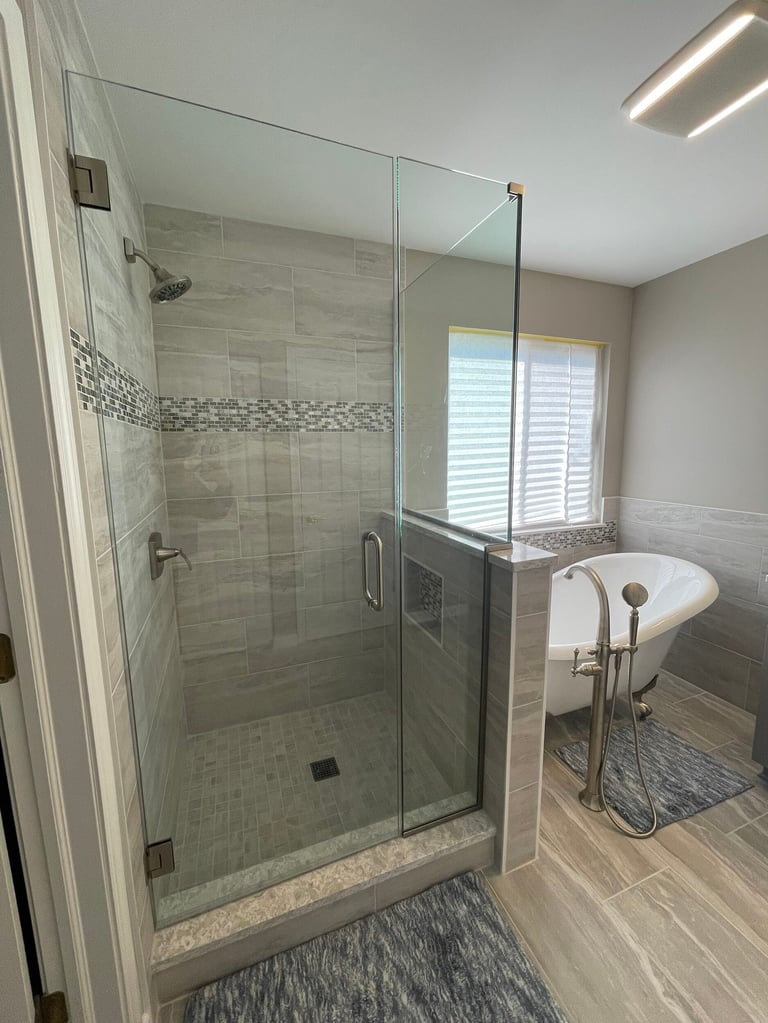 Guest bathroom remodel in Libertyville, IL by Century Kitchens & Bath with walk-in shower and single vanity
